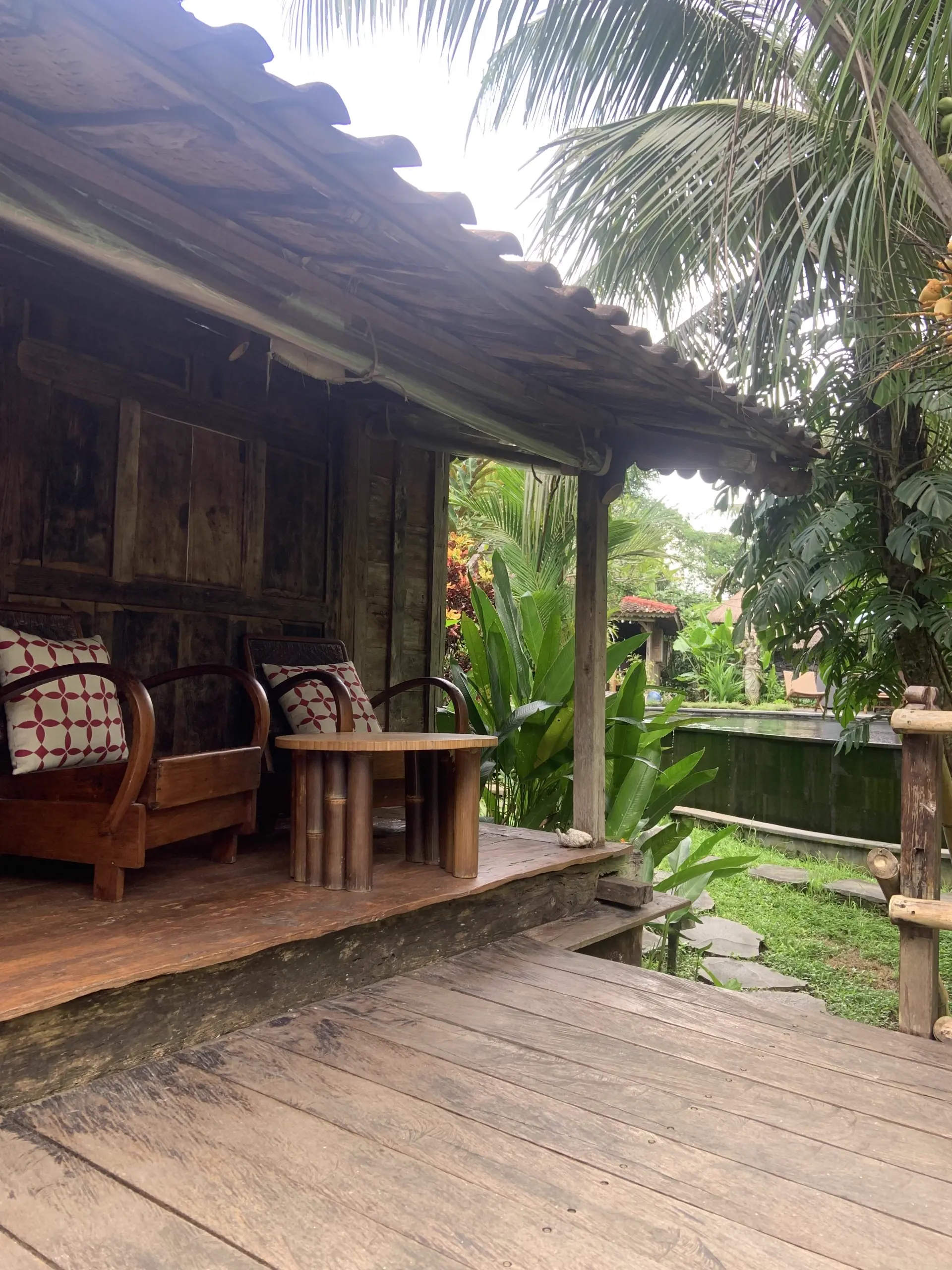 The veranda of one of the houses, looking out over the garden